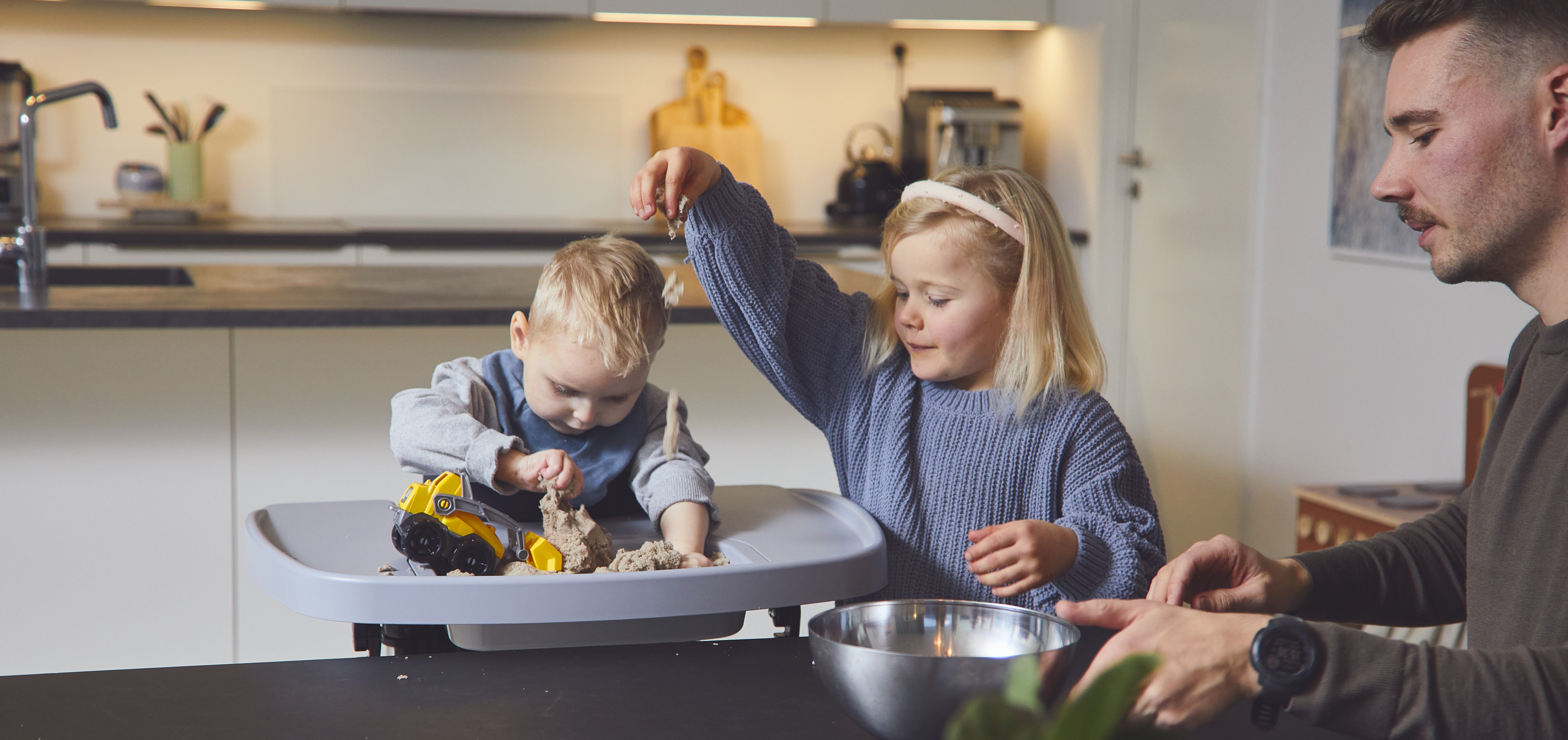 Charlie playing with kinetic sand