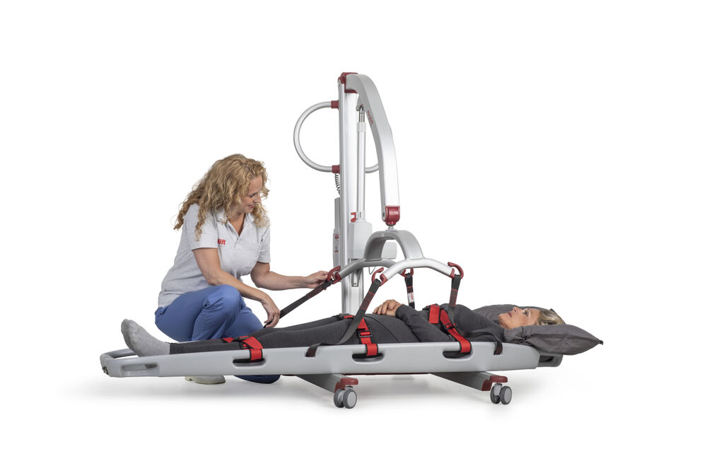 Molift Mover 205 with Stretcher carer sitting with patient