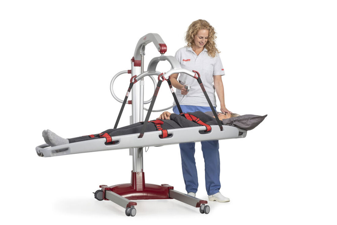 Molift Mover 205 with Stretcher carer standing with patient