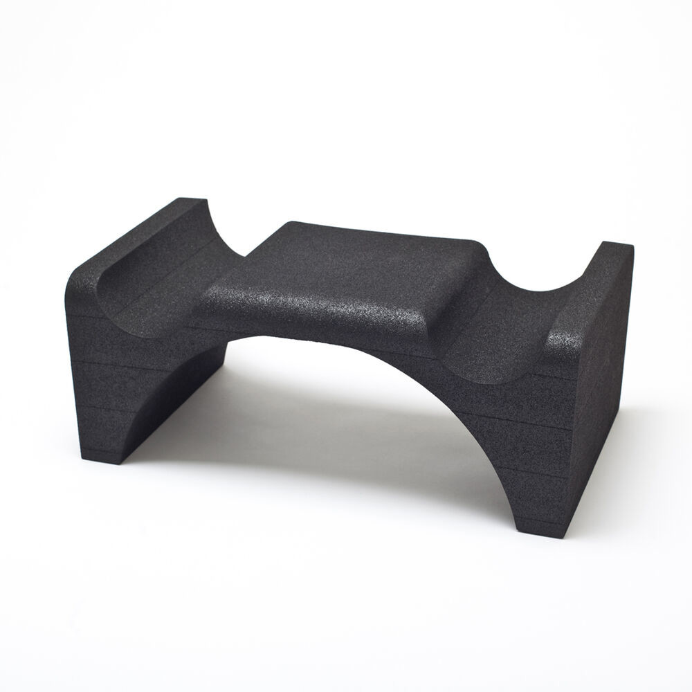 Place and support the arms during x-ray and scanning.