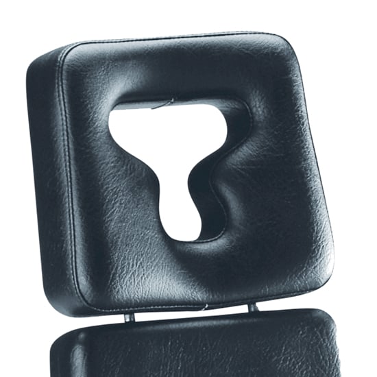 Anatomic head support with facial aperture