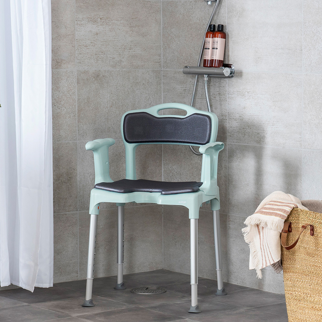 Etac Swift lagoon green with seat and back support pad environmental