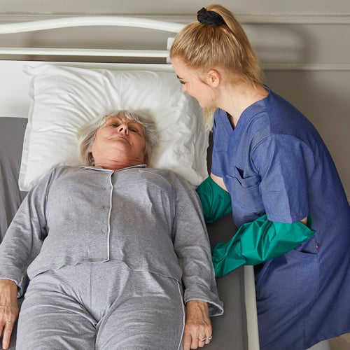 Immedia MultiGlide Glove_User in bed_Carer (6).jpg