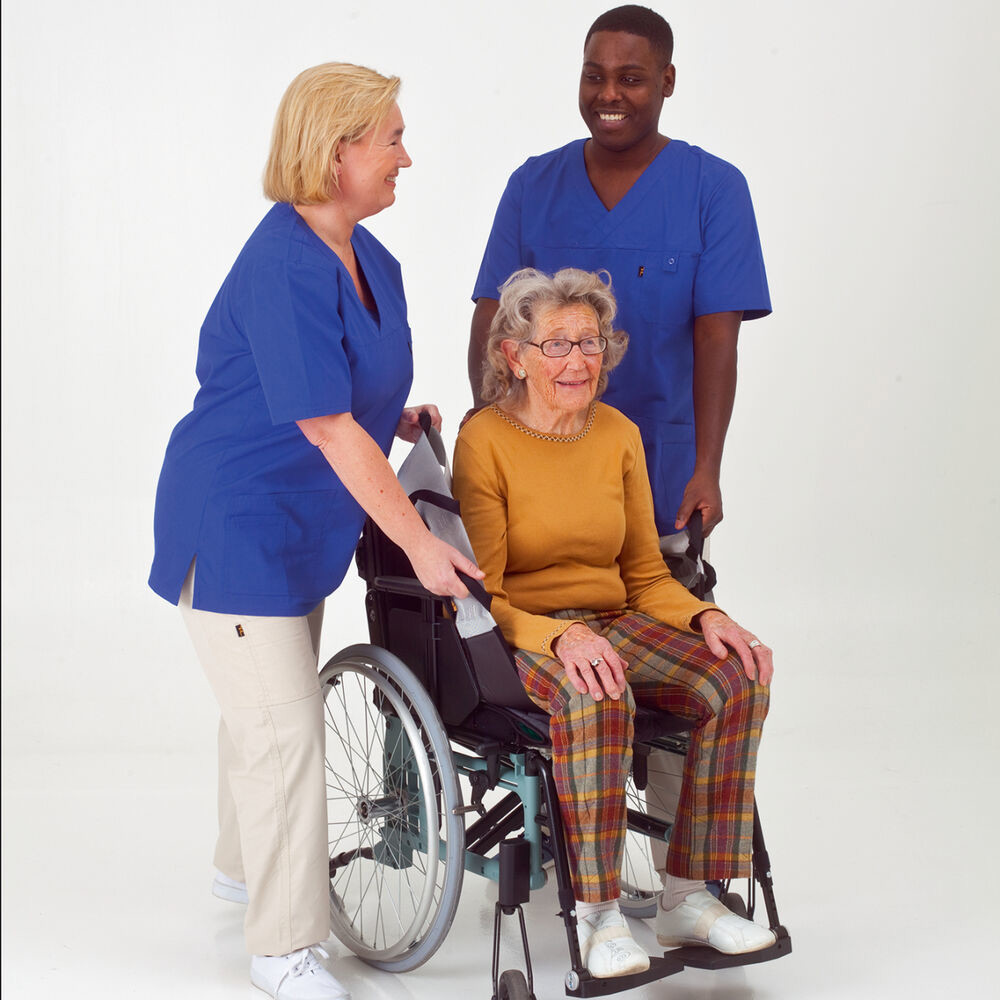 With one or two caregivers, a user can be repositioned further back in a chair by moving the user slightly from side to side.