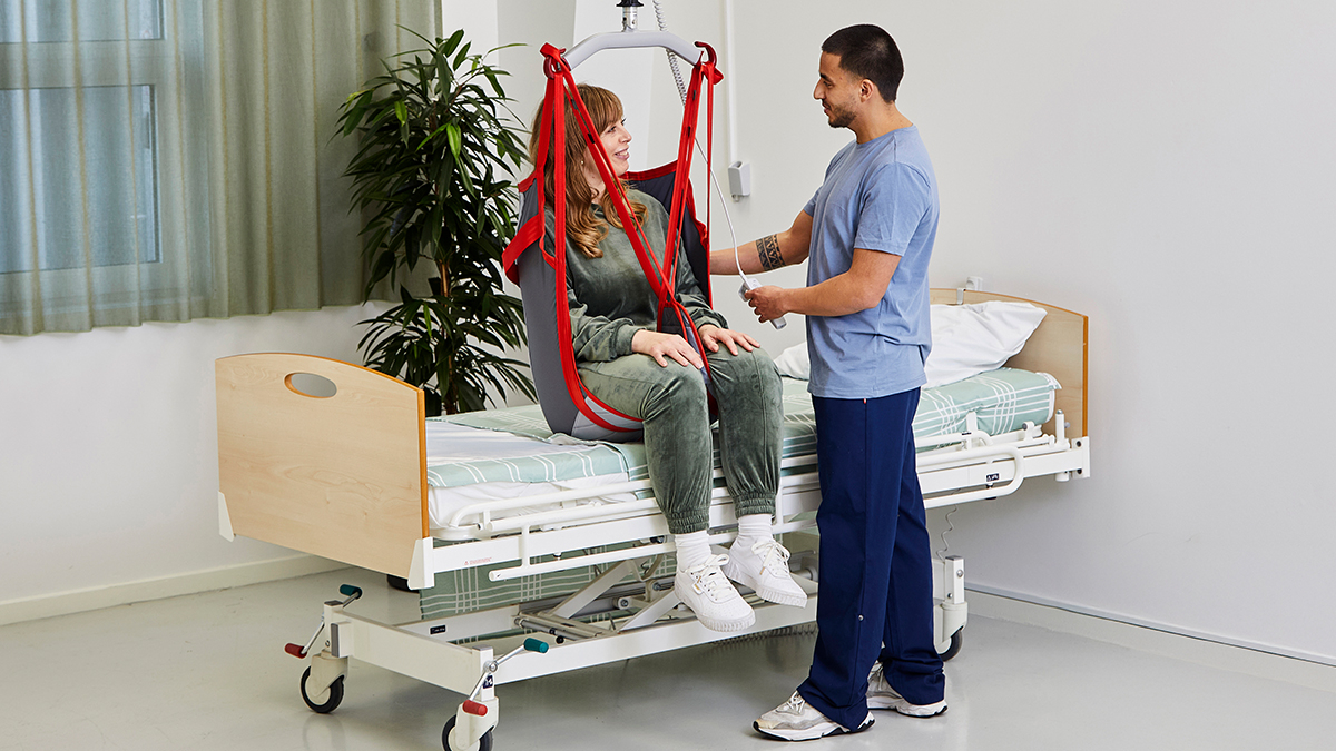 Man in a Molift RgoSling MediumBack Padded