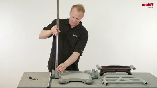 Instructions on how to assembly the sit-to-stand platform Molift Raiser Pro.