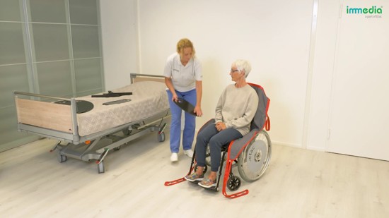 How to apply sling leg straps on a patient wheelchair.