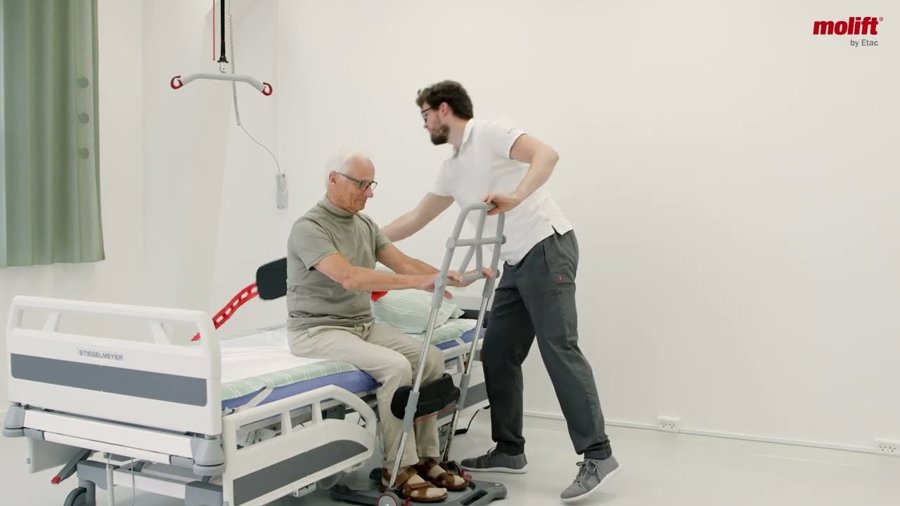 Firm support when standing up or sitting down and during transfer with Molift Raiser Pro