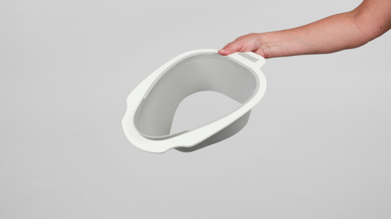 How to safely handle the pan and Splash guard lower 
