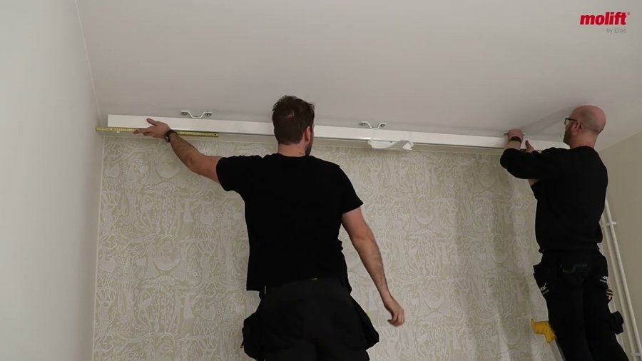 Watch our authorized Molift service technicians install the ceiling-mounted Molift Rail System (MRS) in a room at a newly built elderly care home.
