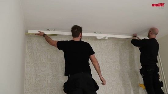 Watch our authorized Molift service technicians install the ceiling-mounted Molift Rail System (MRS) in a room at a newly built elderly care home.