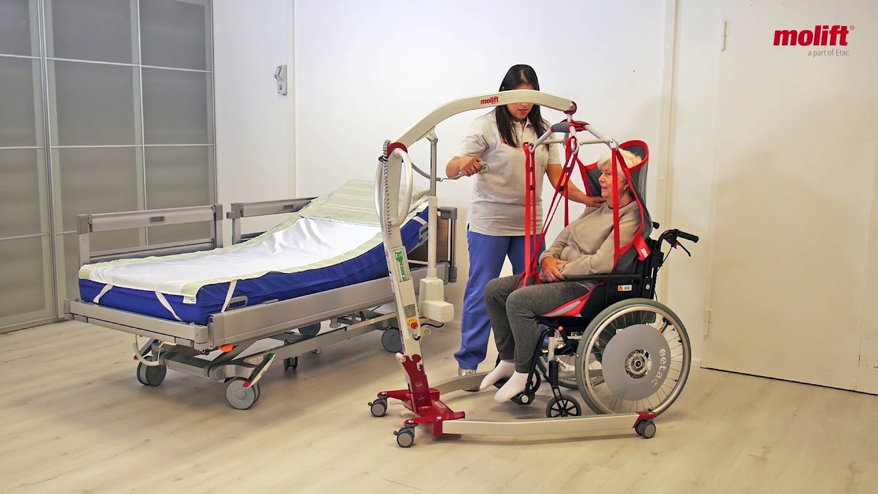 How to transfer from wheelchair to bed using Molift RgoSling HighBack.