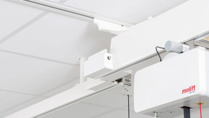 Molift Rail System - Hvordan bruke overgangskoblingen